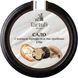 Detailed view: Pork fat with black truffles and mushrooms